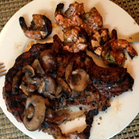 Montreal Steak with Tiger Shrimps and Mushrooms 